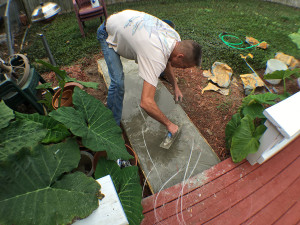 Careful troweling around protruding fiber strands before final cure