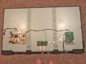 Sharp LC-80LE642U with rear cover removed for troubleshooting