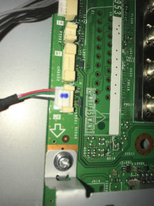 Close-up of Sharp LC-80LE642U main board with board labels visible